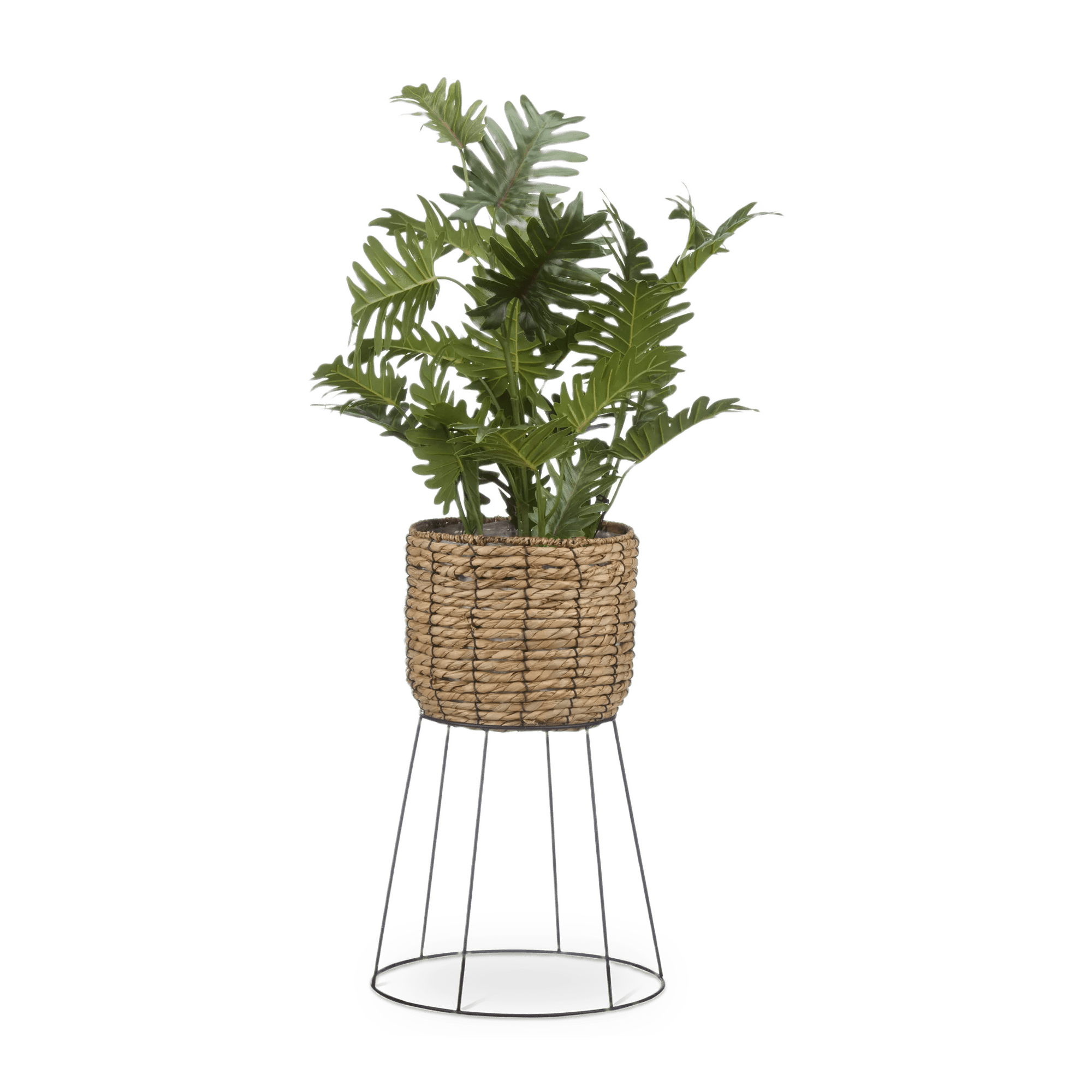 Plante artificielle à feuilles découpées dans un Pot en rotin naturel