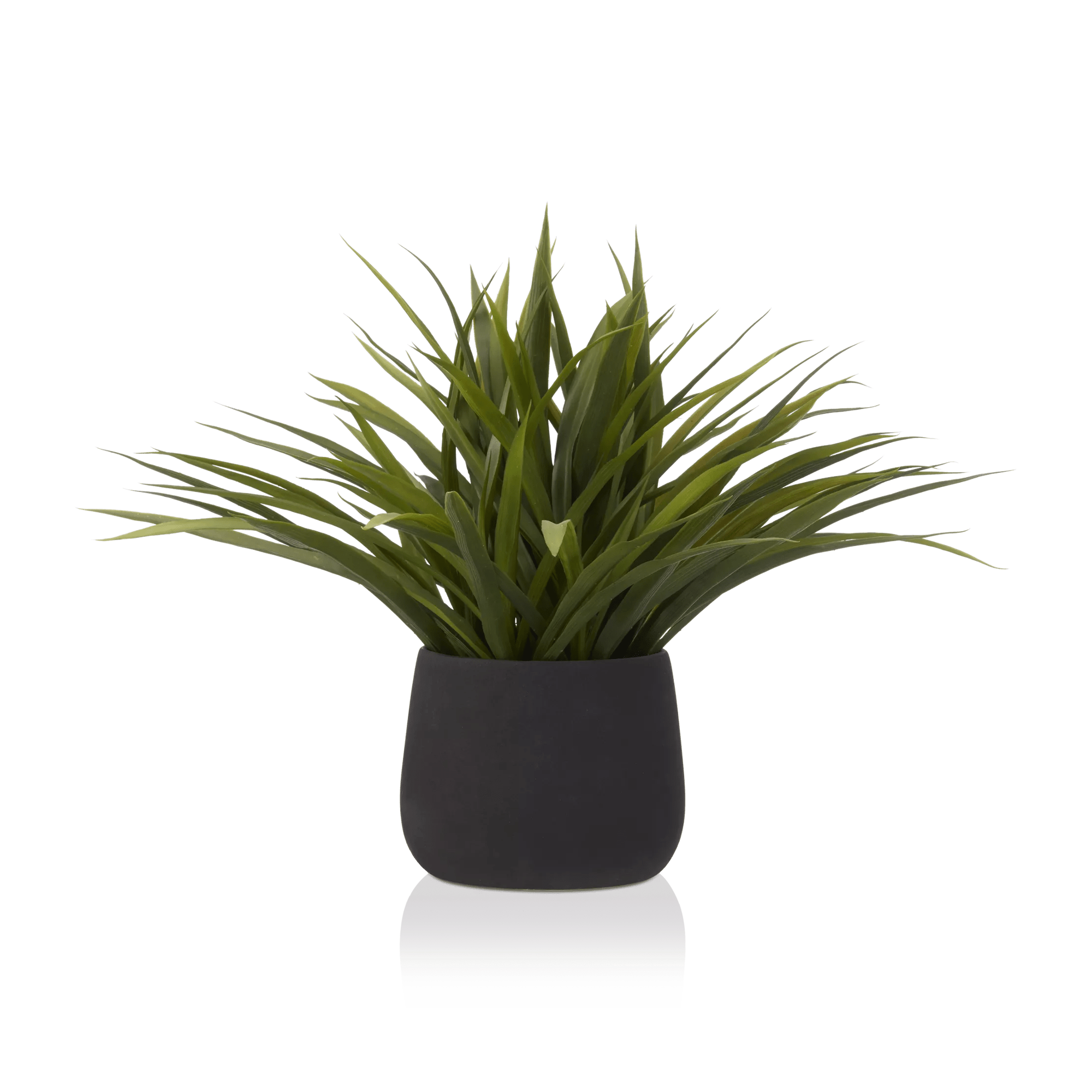 Herbes artificielles dans un Pot en céramique